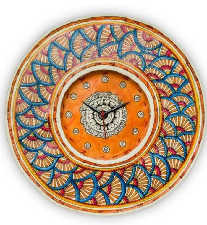 Orange Flower hand-painted Tholu wall clock with bright floral patterns, adding a pop of color to your space