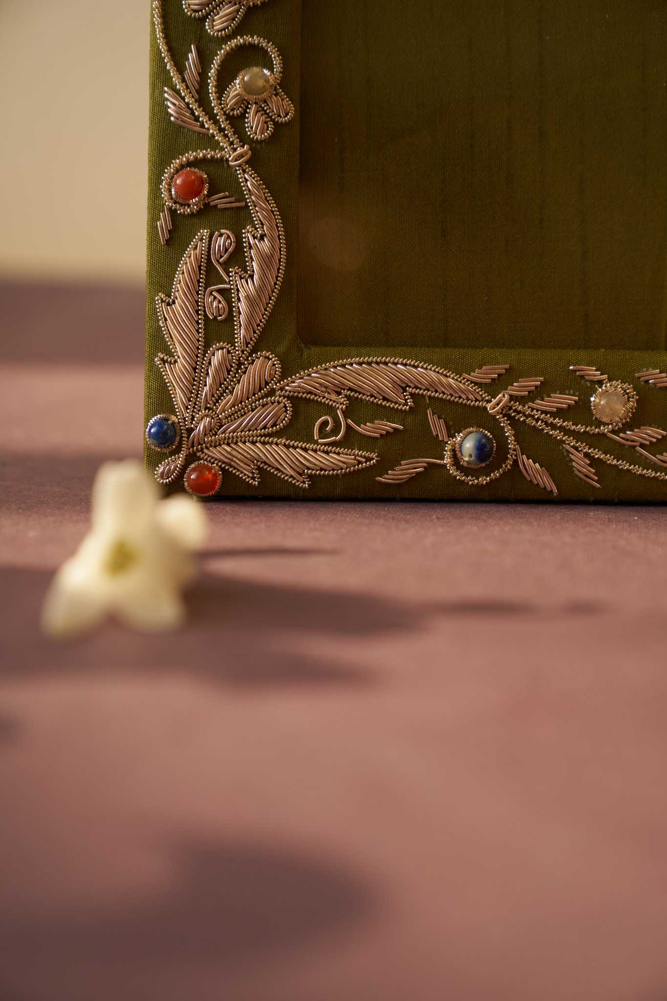 Bel Green Zardozi photo frame featuring elegant handcrafted embroidery with intricate gold and silver threadwork, accentuated by delicate bead and sequin details. A sophisticated decor piece perfect for displaying cherished memories in a luxurious setting.